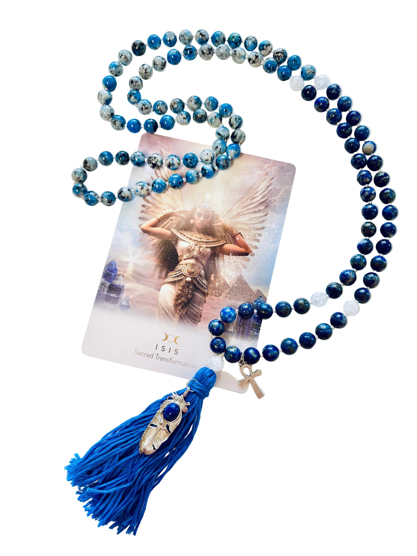 Goddess Isis mala necklace with K2, lapis lazuli, and quartz beads and a blue tassel on a white background